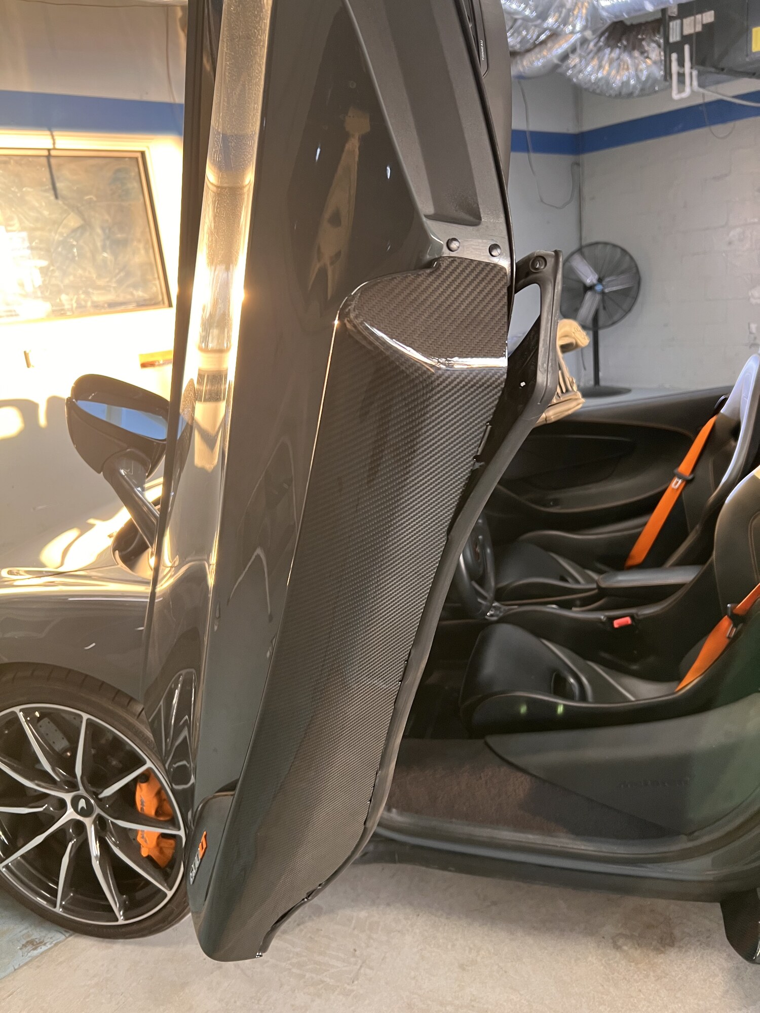 McLaren receiving JC Mobile Paint mobile auto body service