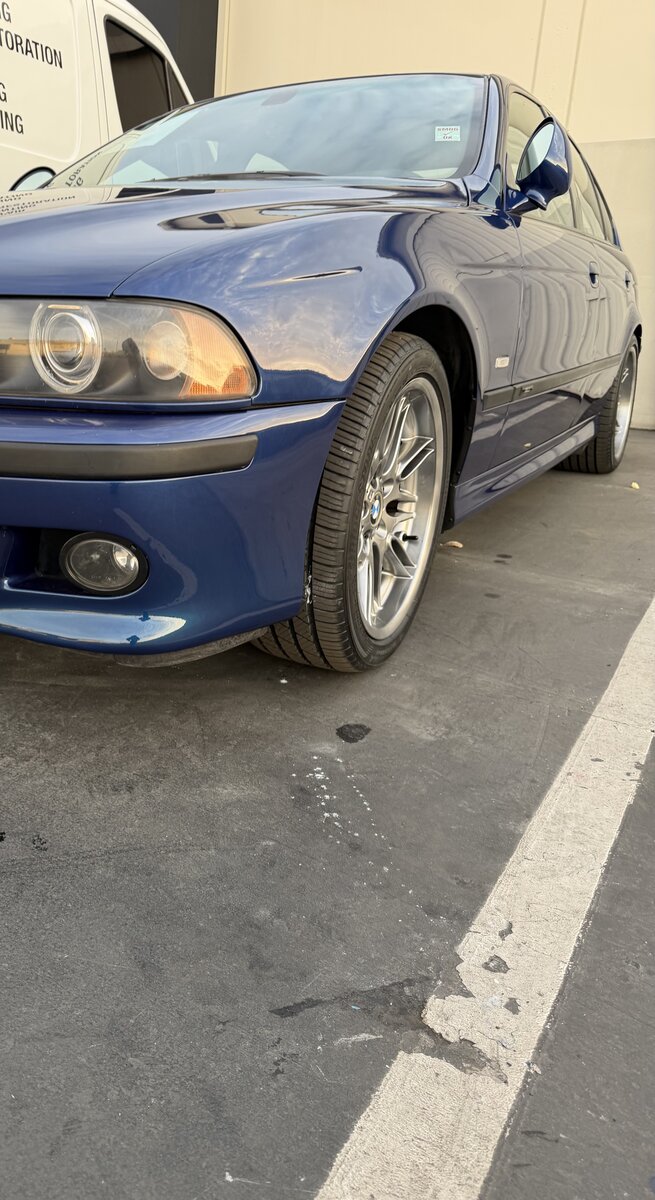 BMW M5 front bumper restored on-site — after