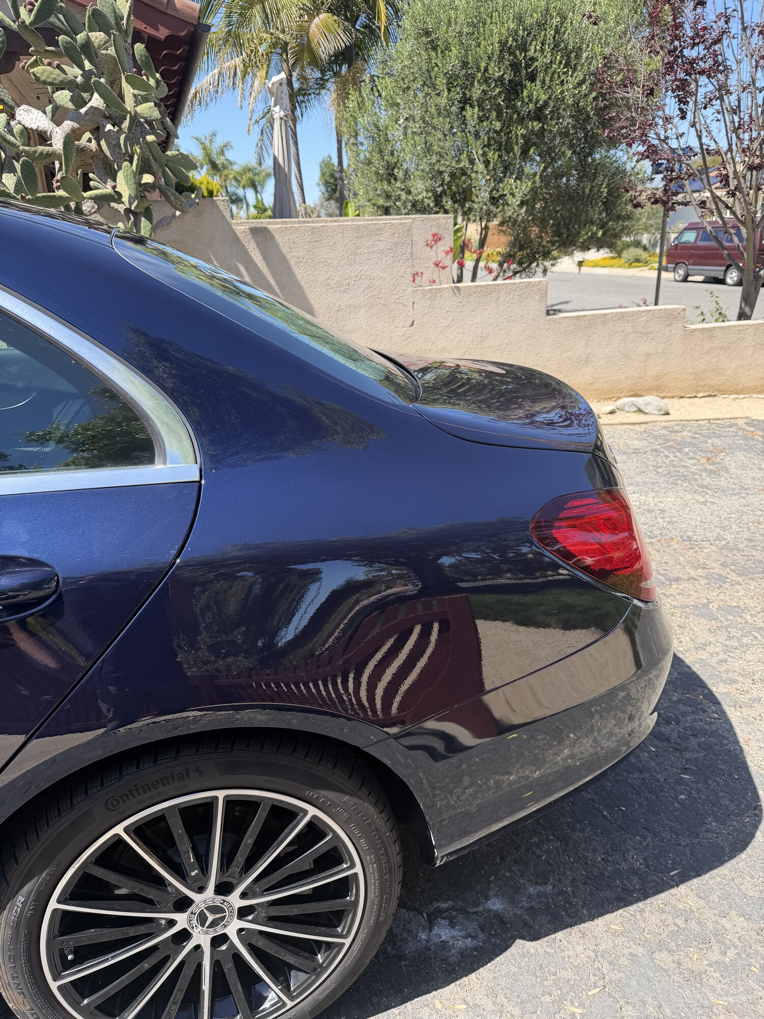 Mercedes-Benz rear quarter dent and paint repair — before