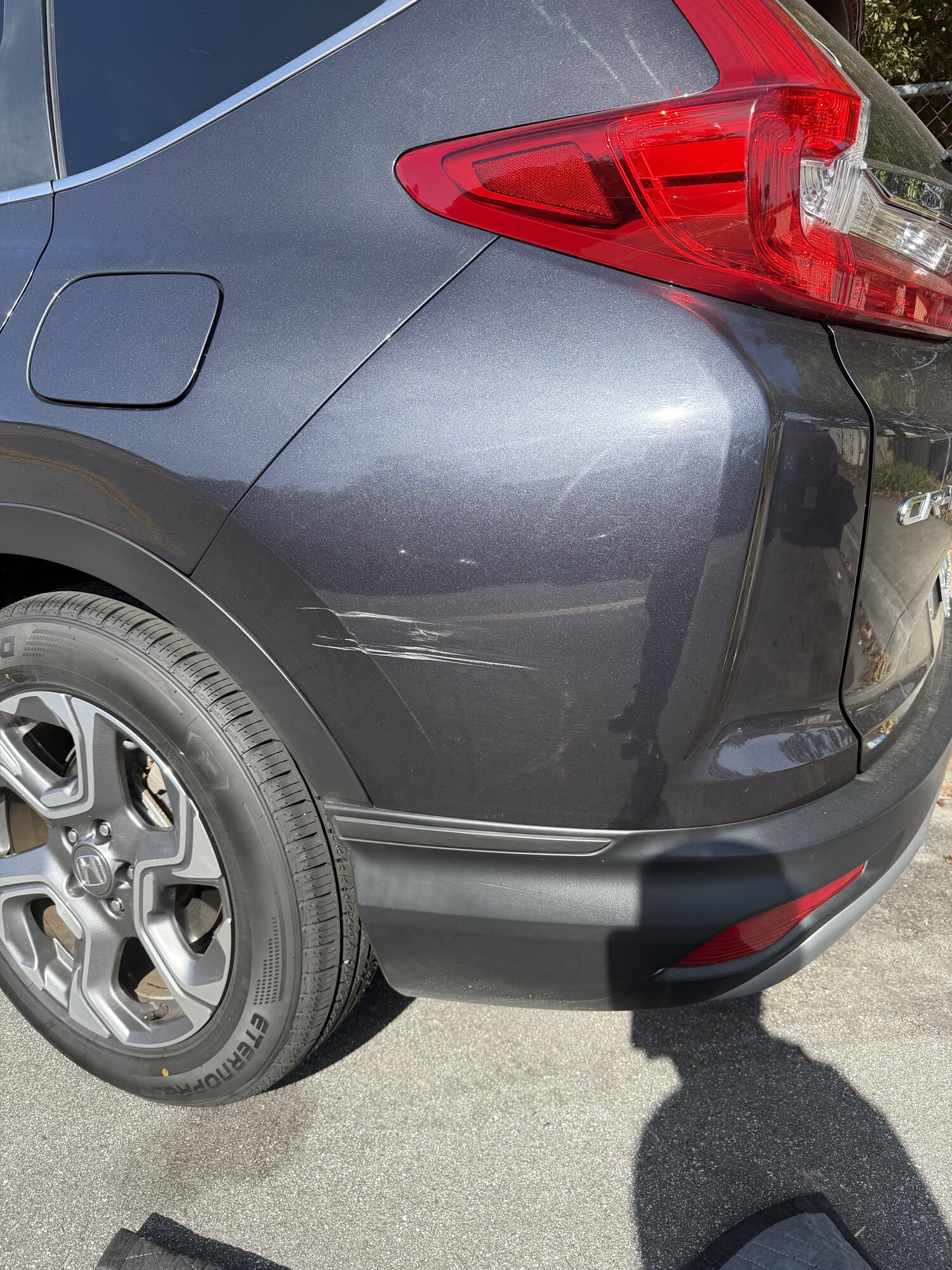 Honda CR-V deep paint scrape — second angle — before